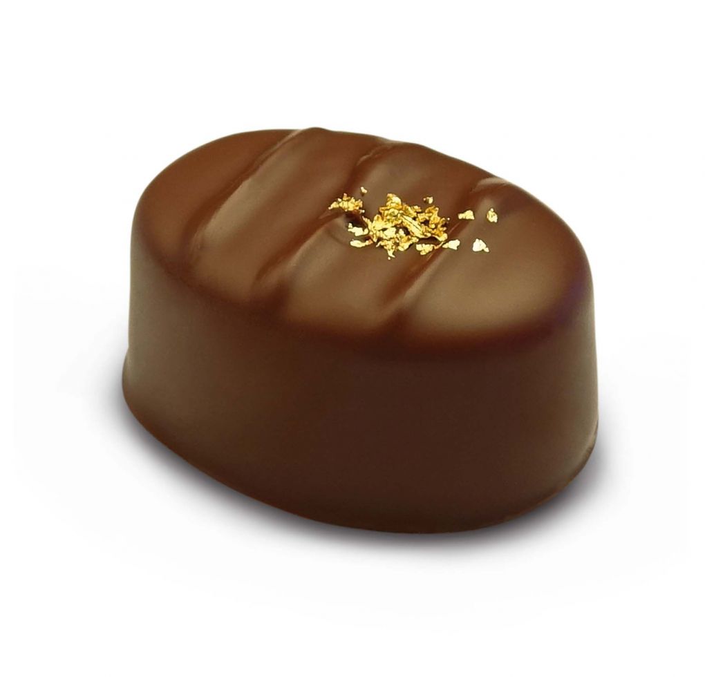 Edelpraline Grand Cru mit Edelbrand - Schokolade - Nougat - Schweizer Schokolade - Pralinen - Schoggistängeli - weisse Schokolade - Napolitains - Osterhase Schokolade- Krokant- Schokoriegel - Schokoladentafel - Milchschokolade - Tafelschokolade - Branche Schokolade - Nougat kaufen - Mandelkrokant - Schokoladengeschenke - Schokoladenherz - Schoggi Hasen